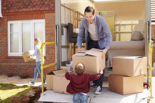 Local moving truck and crew preparing a Belmont home relocation