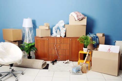 Man with van moving boxes and furniture during a house removal