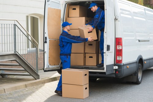Commercial movers handling desks and office equipment in Belmont