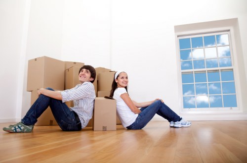 Packed boxes and furniture loaded for transport