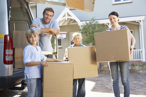 Belmont moving van helping with household furniture transport