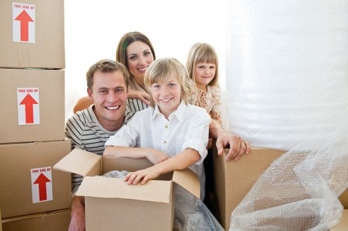 Commercial relocation team moving office equipment in Belmont