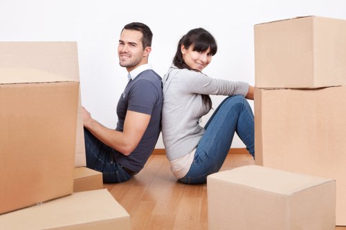 Moving team handling furniture in Belmont suburb