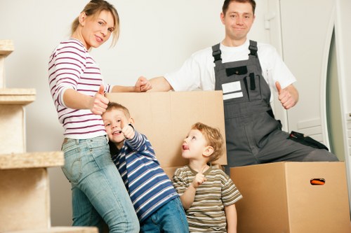 Careful wrapping of fragile belongings during a Belmont relocation