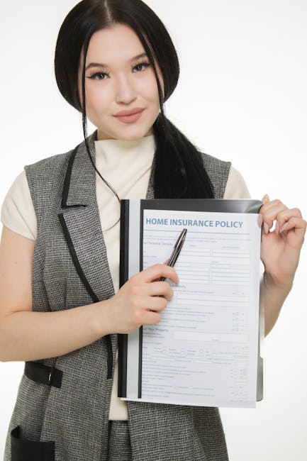 A close-up view of a home insurance policy form titled 'Home Insurance Policy,' featuring sections for personal details, previous insurance history, and additional information, with spaces for handwri